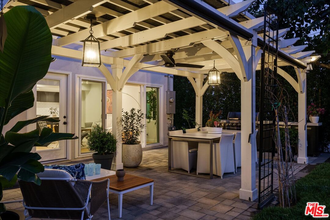 1735 Idlewood Road Glendale, CA 91202 - Photo 49 of 64 a view of a patio with dining table and chairs