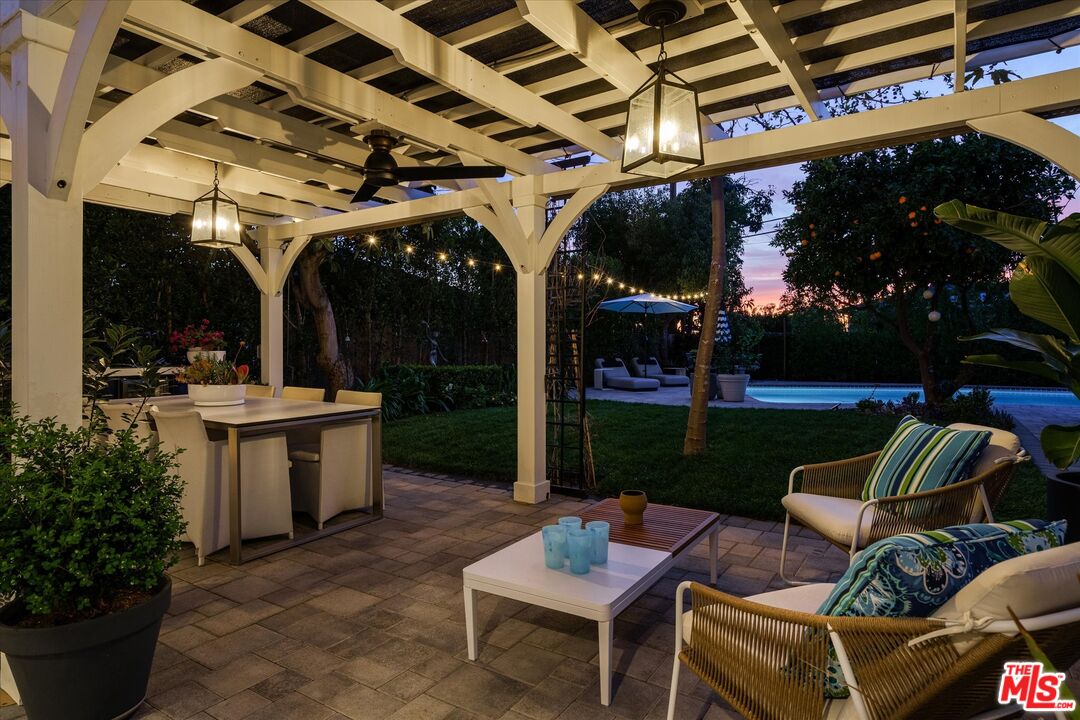 1735 Idlewood Road Glendale, CA 91202 - Photo 50 of 64 a view of a patio with couches table and chairs and potted plants