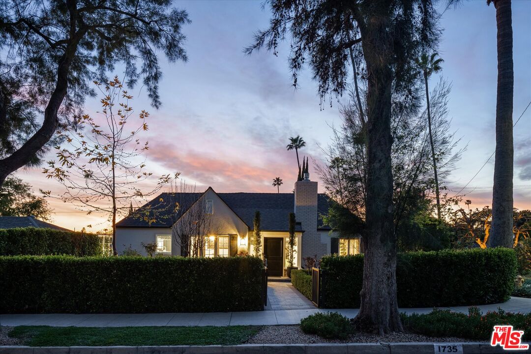 1735 Idlewood Road Glendale, CA 91202 - Photo 51 of 64 a front view of a house with a yard