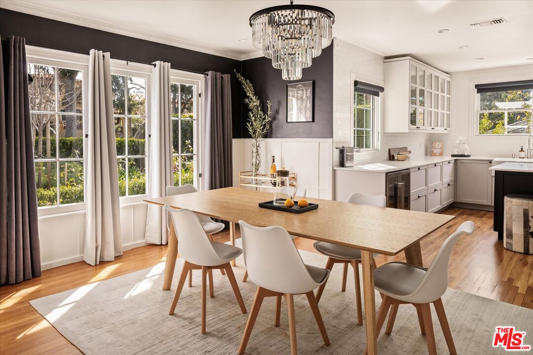 1735 Idlewood Road Glendale, CA 91202 - Photo 9 of 64 a view of a dining room with furniture window and wooden floor