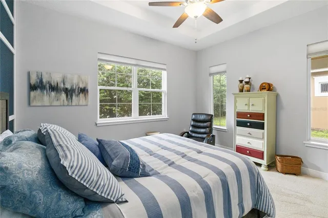 a bathroom with a granite countertop sink mirror and double
