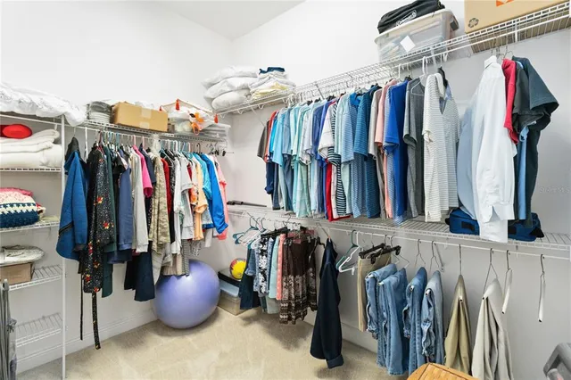 a view of a street with a building in the background