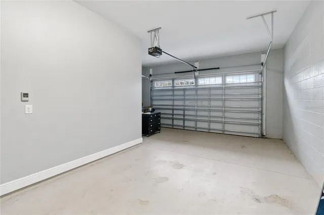 a view of a swimming pool with outdoor seating and city view