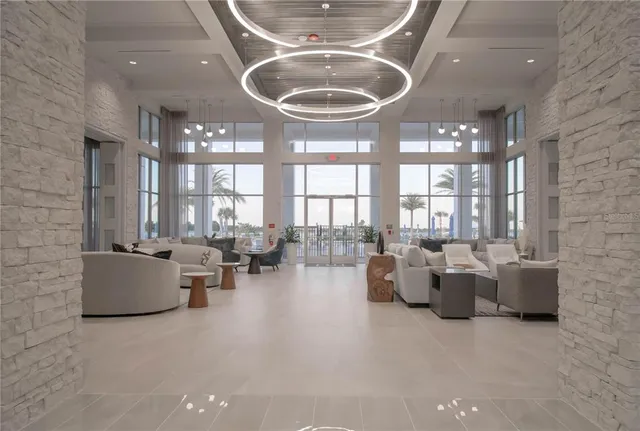 an aerial view of residential houses with outdoor space and swimming pool