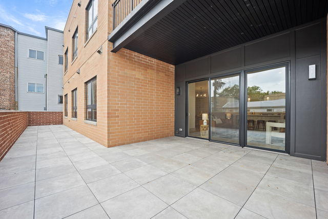 1548 West Ardmore Avenue, Unit 4C Chicago, IL 60660 - Photo 36 of 37 a view of a porch with seating space
