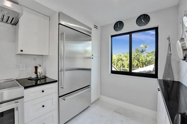 a view of a hallway with seating area