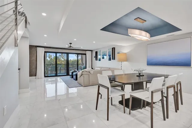 a living room with a large window and table