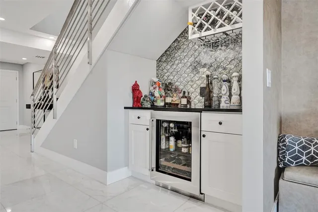a view of a chair and table in the balcony