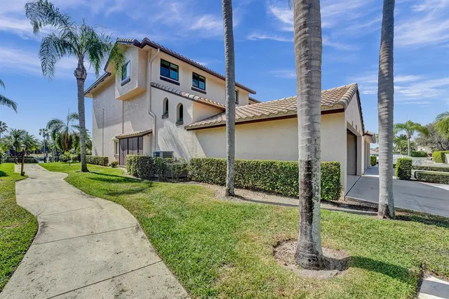 a view of backyard with a garden and plants