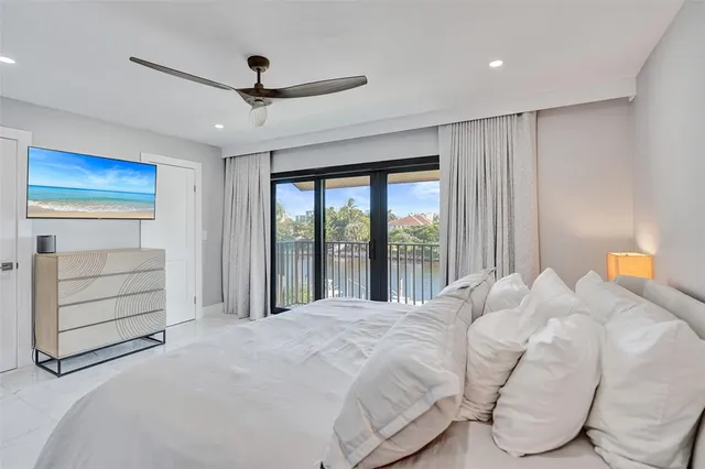 an aerial view of a house with a yard and garden