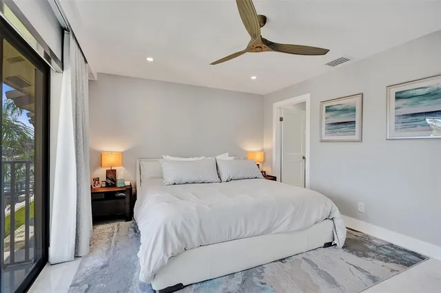 a view of a swimming pool with a lounge chairs