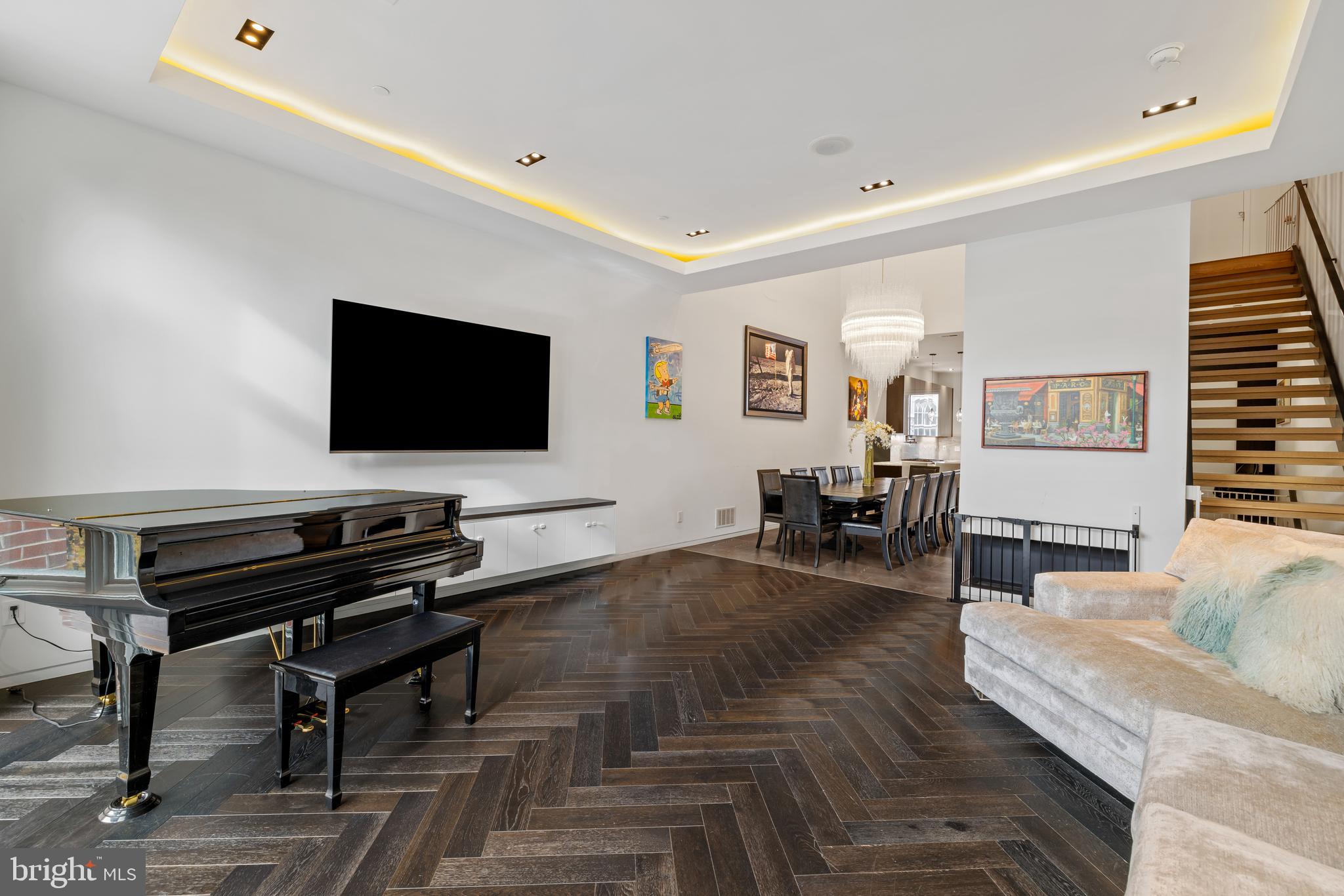 1727 Delancey Place Philadelphia, PA 19103 - Photo 12 of 35 a living room with furniture and a flat screen tv