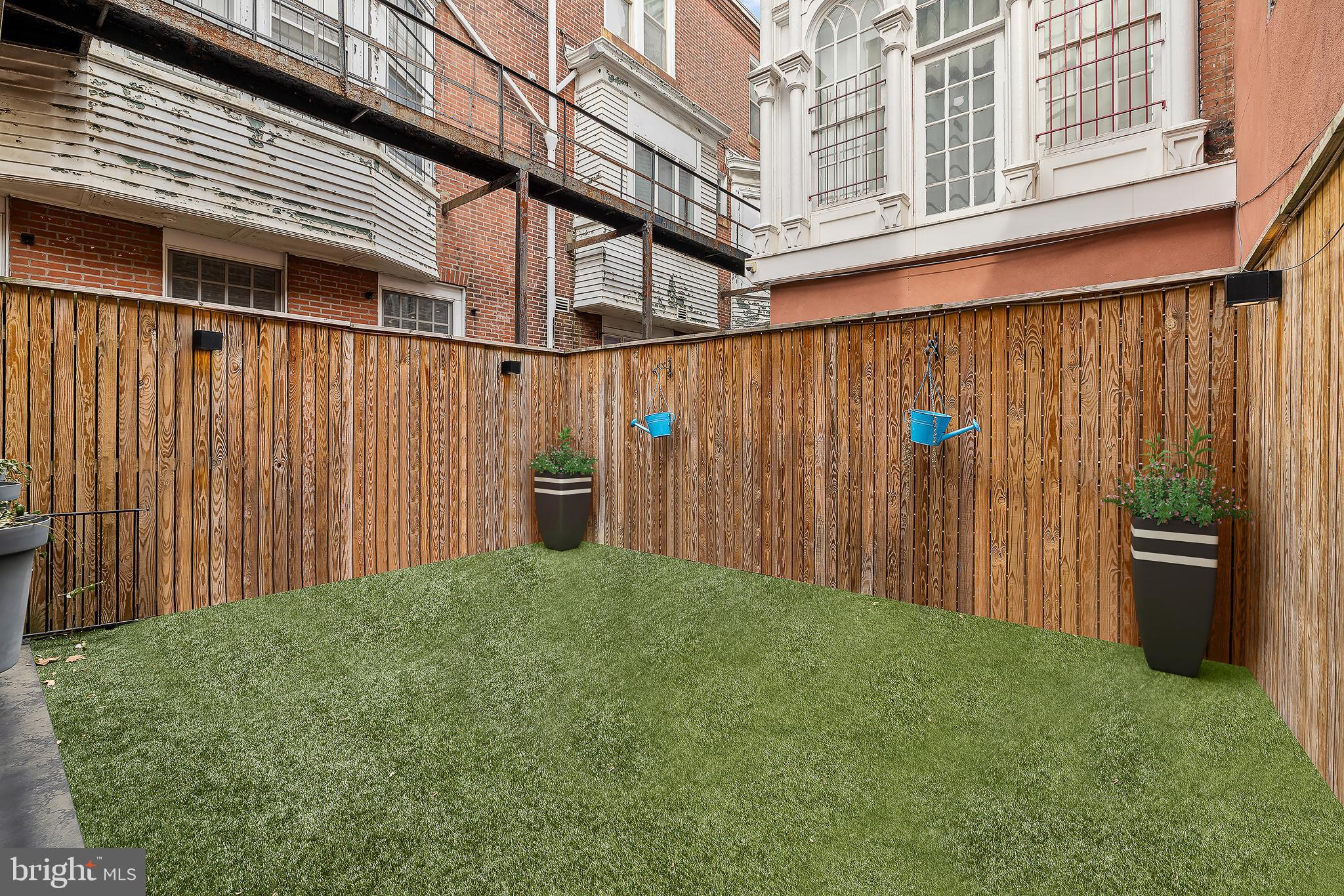 1727 Delancey Place Philadelphia, PA 19103 - Photo 21 of 35 a view of a house with a backyard