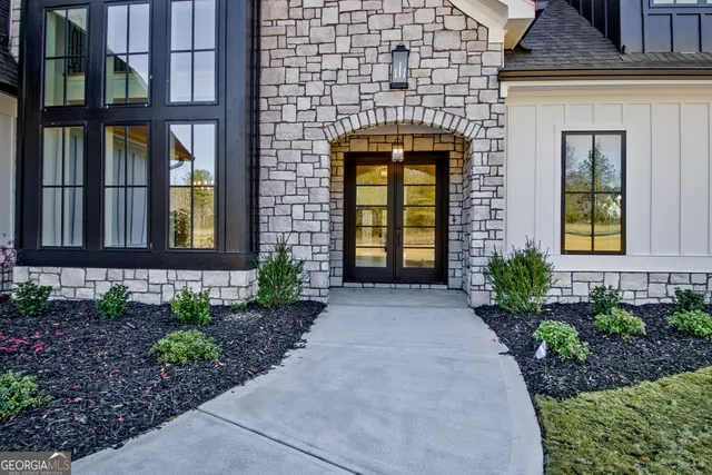 a kitchen with stainless steel appliances granite countertop a stove and a sink