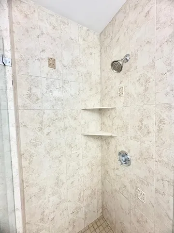 a bathroom with a bathtub sink and vanity