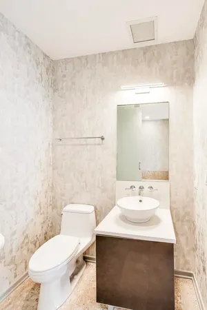 a view of a bathroom with a washer and dryer