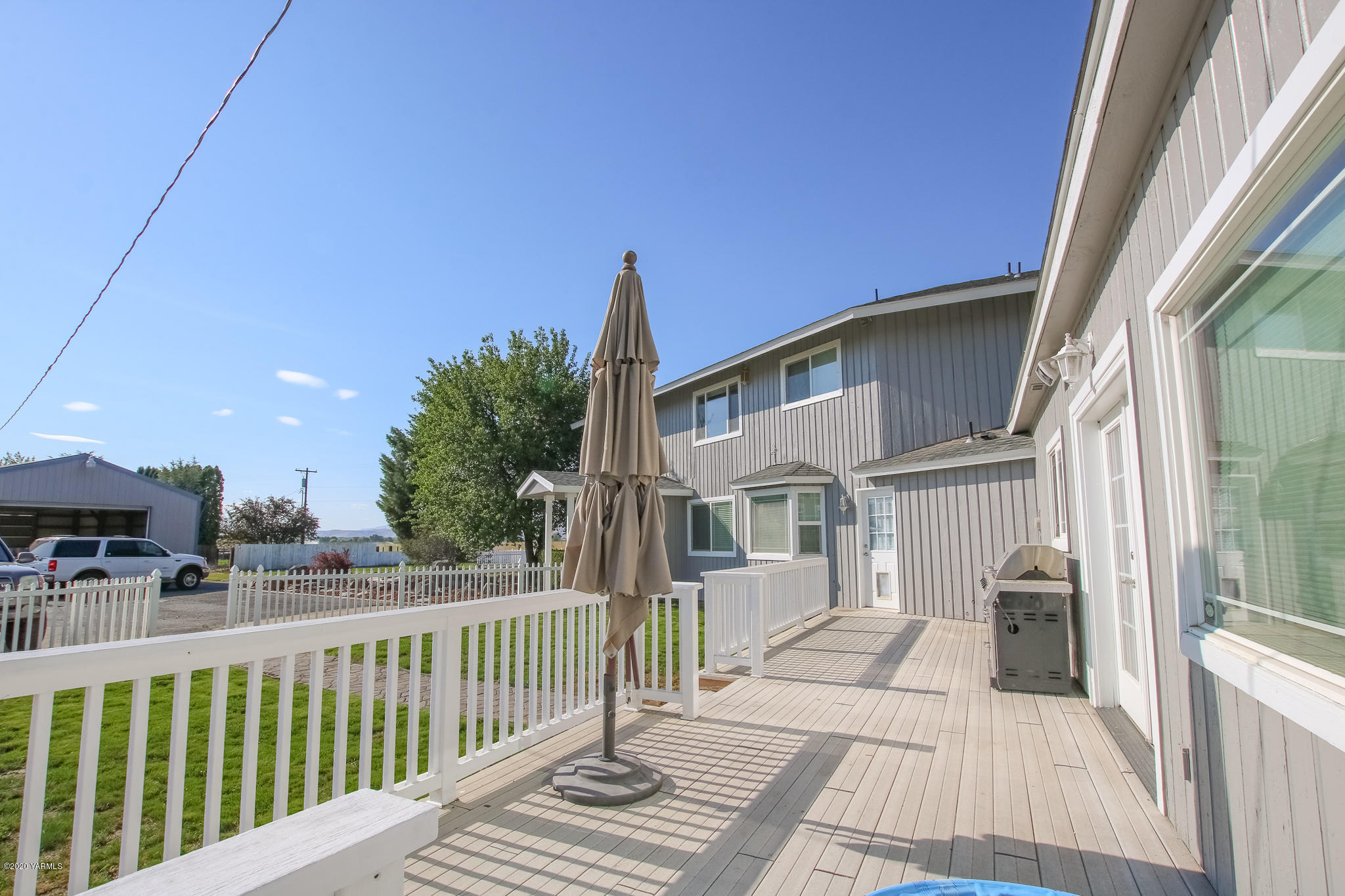 6608 Postma Road Yakima, WA 98901 - Photo 28 of 34 a view of a house with a deck