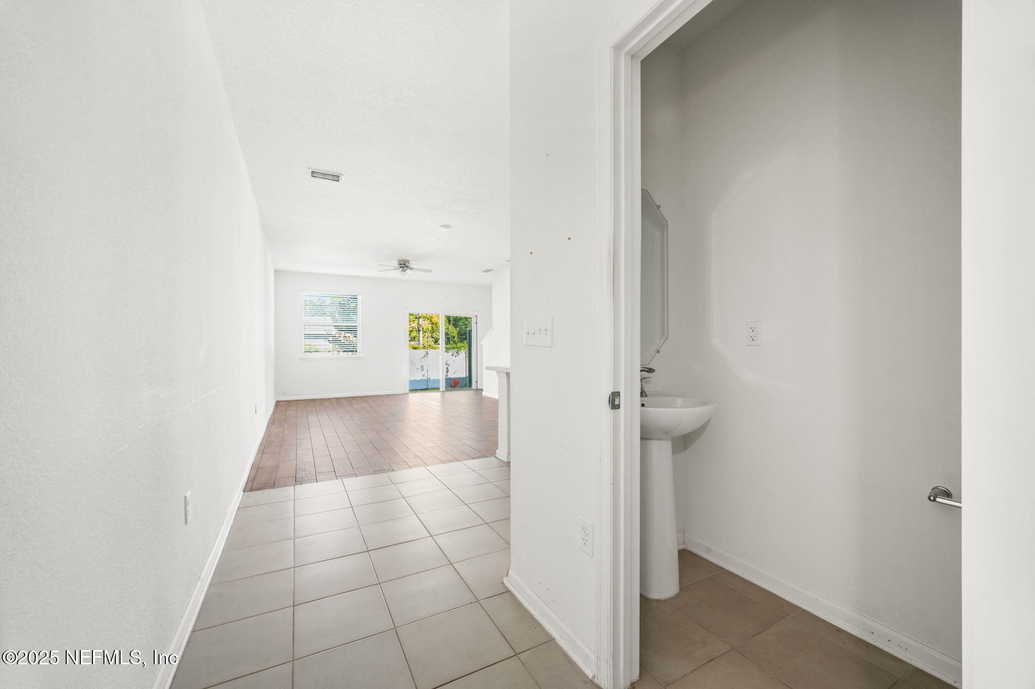 11799 Junegrass Road Jacksonville, FL 32258 - Photo 11 of 33 a view of empty room with wooden floor
