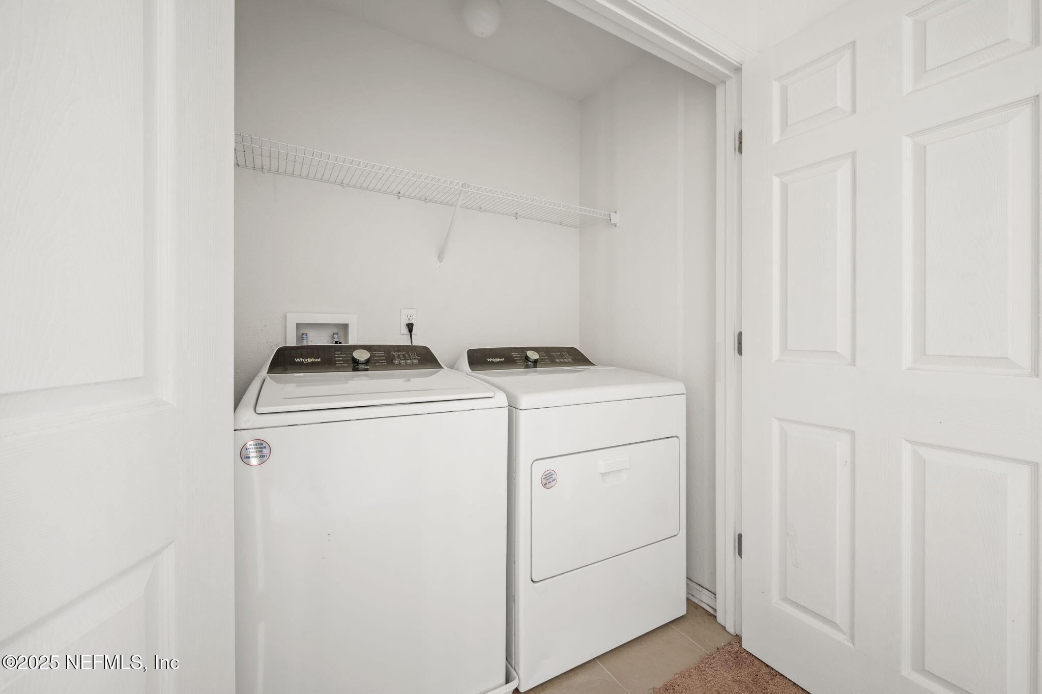 11799 Junegrass Road Jacksonville, FL 32258 - Photo 22 of 33 a room with storage and utility