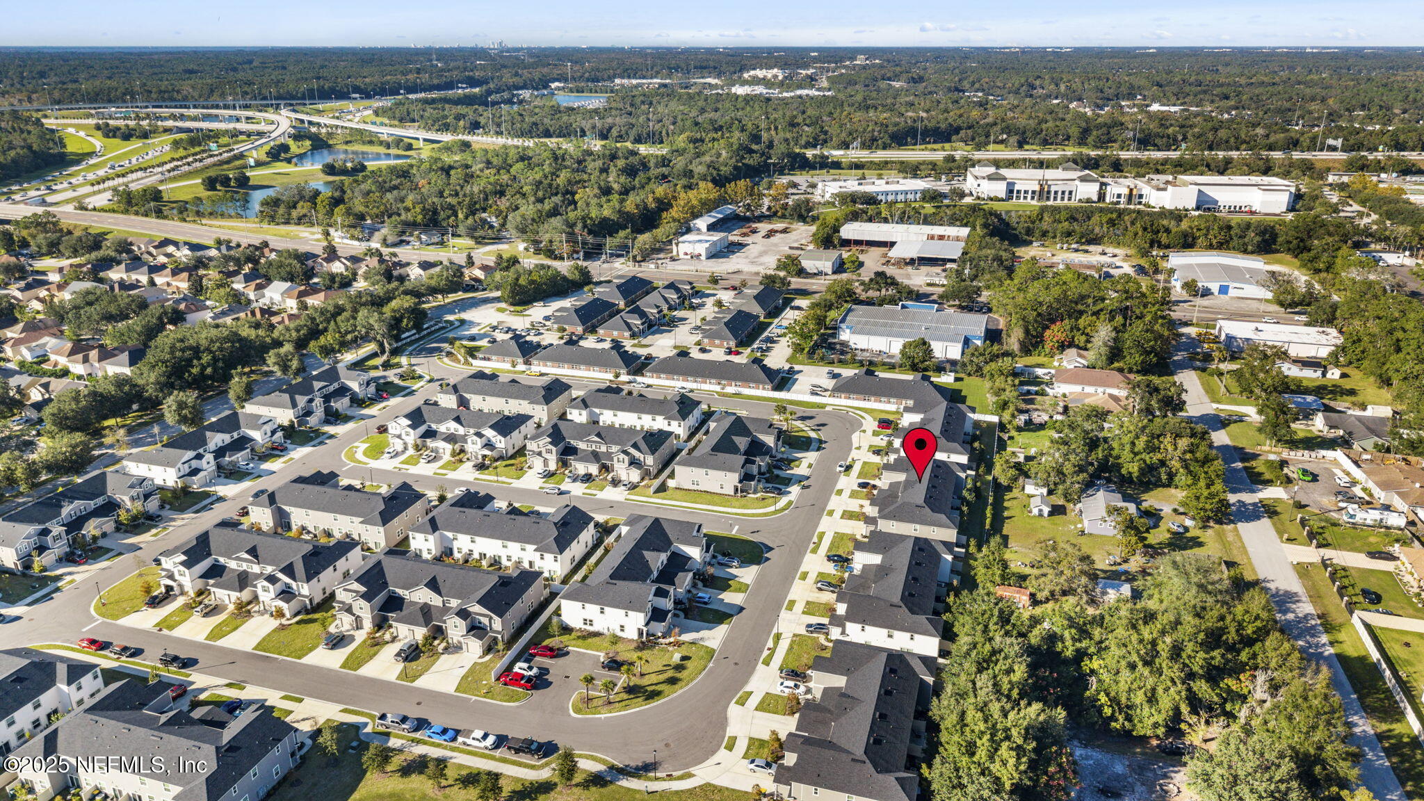 11799 Junegrass Road Jacksonville, FL 32258 - Photo 32 of 33 an aerial view of residential building and parking space