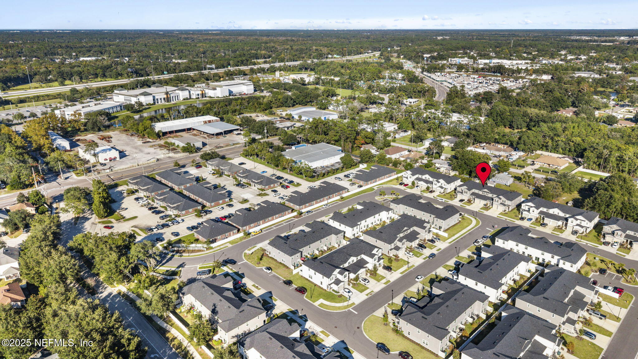 11799 Junegrass Road Jacksonville, FL 32258 - Photo 33 of 33 an aerial view of residential building with parking