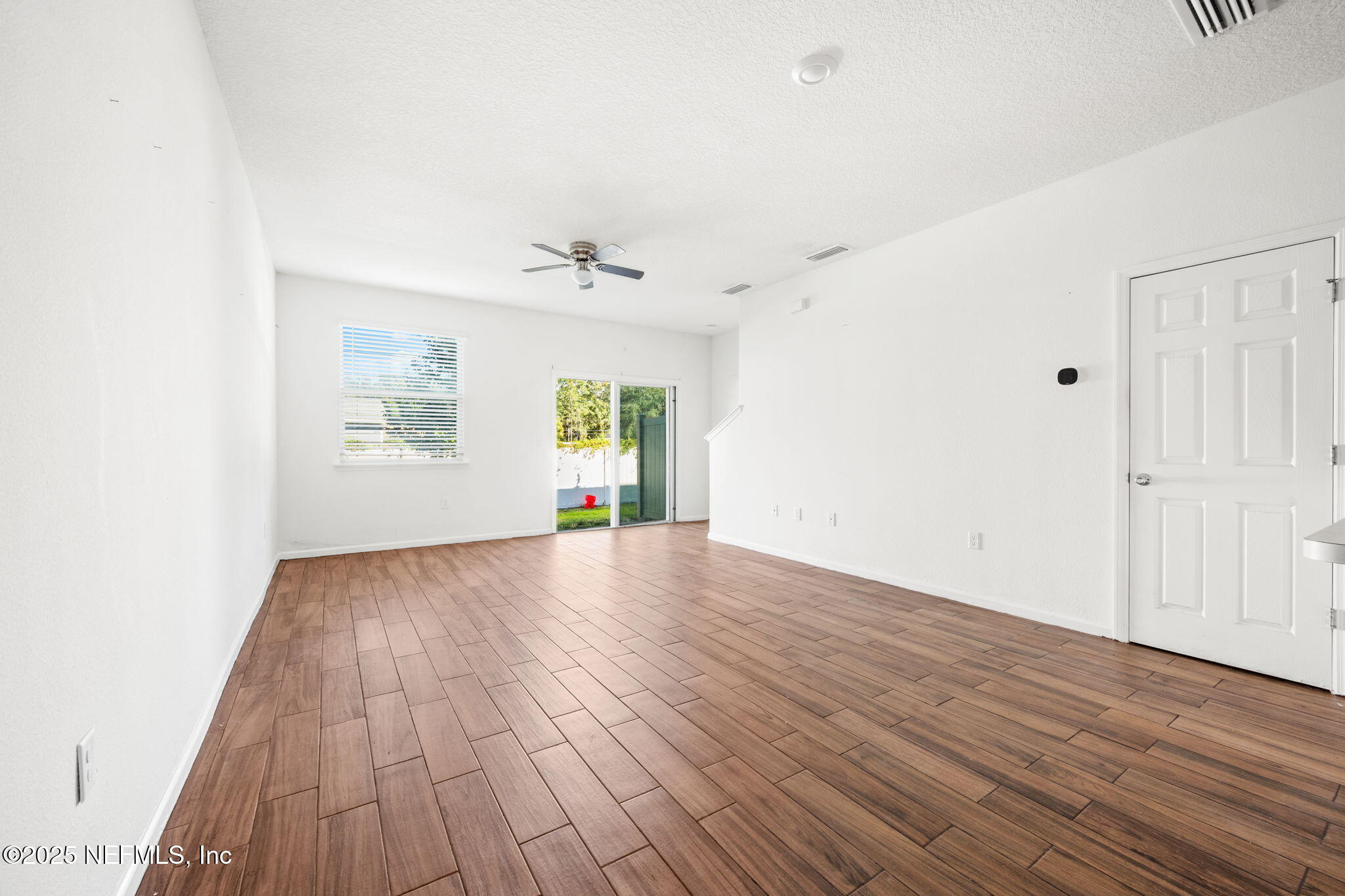 11799 Junegrass Road Jacksonville, FL 32258 - Photo 8 of 33 wooden floor in an empty room