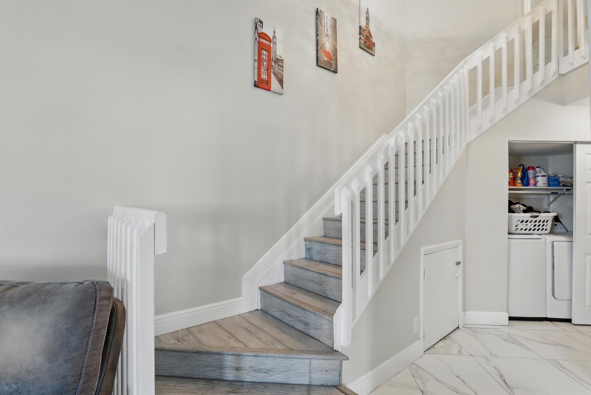 4491 Willow Pond Road, Unit B West Palm Beach, FL 33417 - Photo 15 of 29 a view of entryway and hall with wooden floor