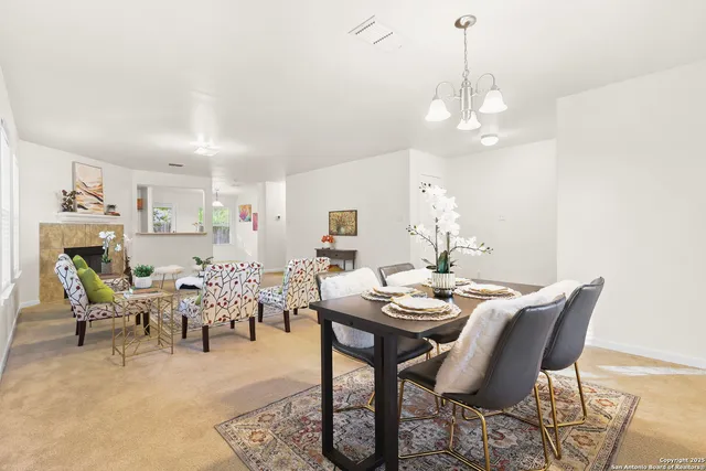 a view of a dining room with furniture