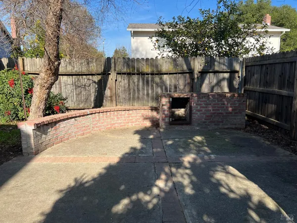 a front view of a house with garage