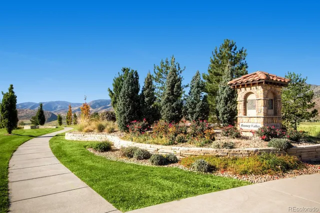 a view of a swimming pool with an outdoor seating
