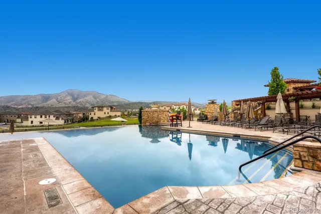 a view of a patio with a garden