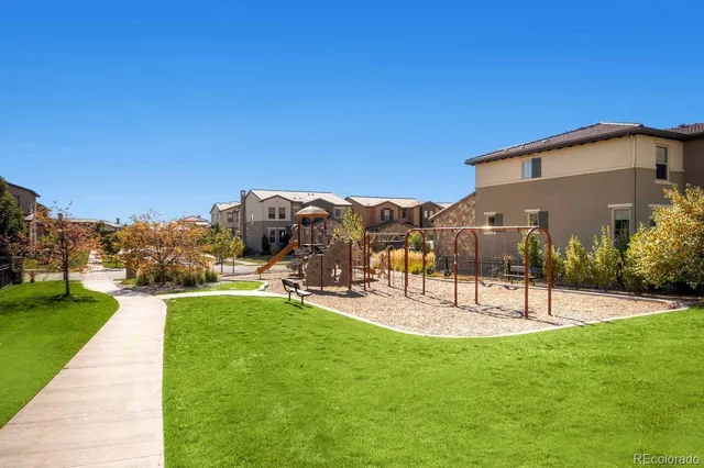 a view of a swimming pool with an outdoor seating