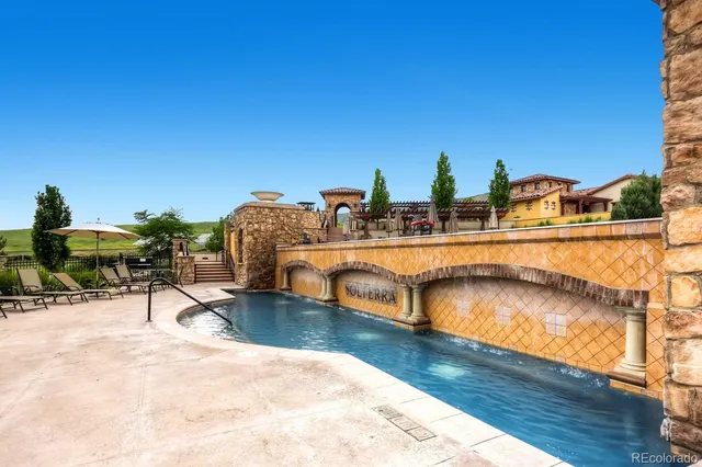 a street view with tall buildings and a street