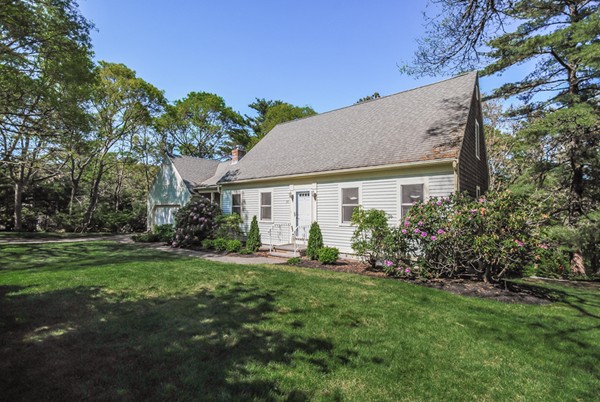 55 Captain Carltons Road Barnstable, MA 02635 - Photo 2 of 24 a aerial view of a house with a yard and potted plants