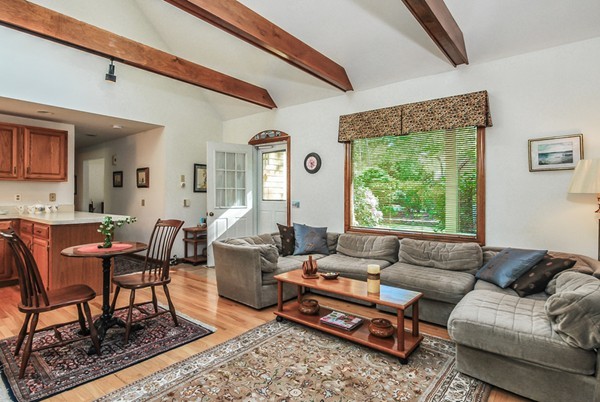 55 Captain Carltons Road Barnstable, MA 02635 - Photo 3 of 24 a living room with furniture and a large window