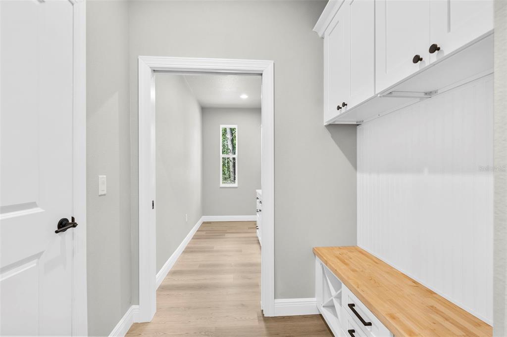 3 Lupine Street Homosassa, FL 34446 - Photo 14 of 44 a view of room with window and stairs