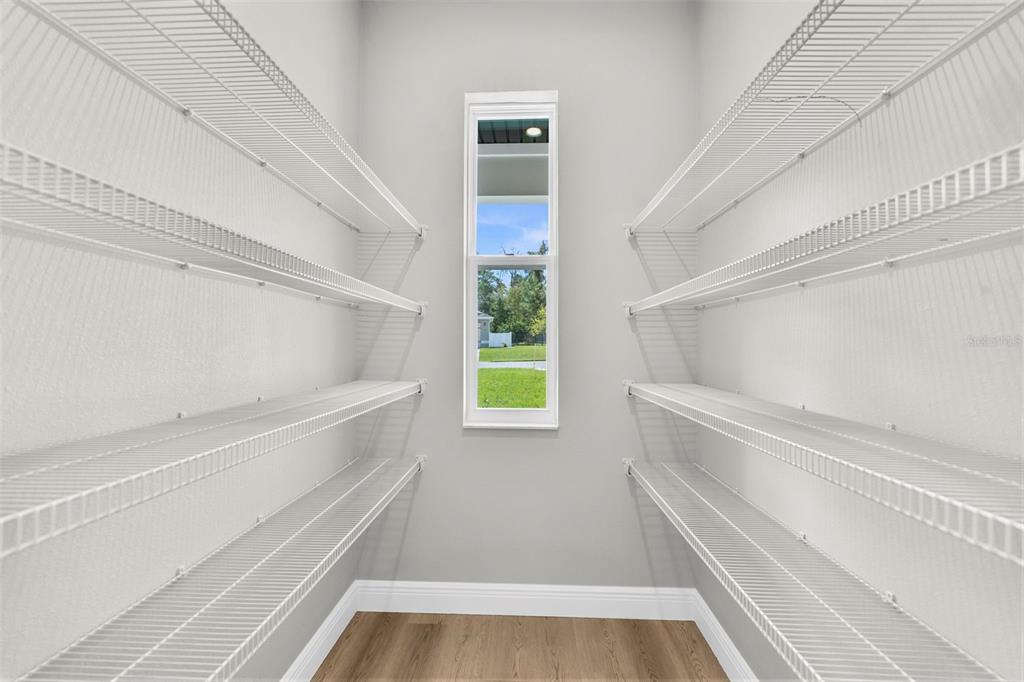 3 Lupine Street Homosassa, FL 34446 - Photo 16 of 44 a view of walk in closet with window