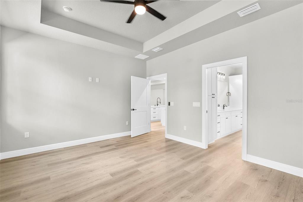 3 Lupine Street Homosassa, FL 34446 - Photo 23 of 44 wooden floor in an empty room