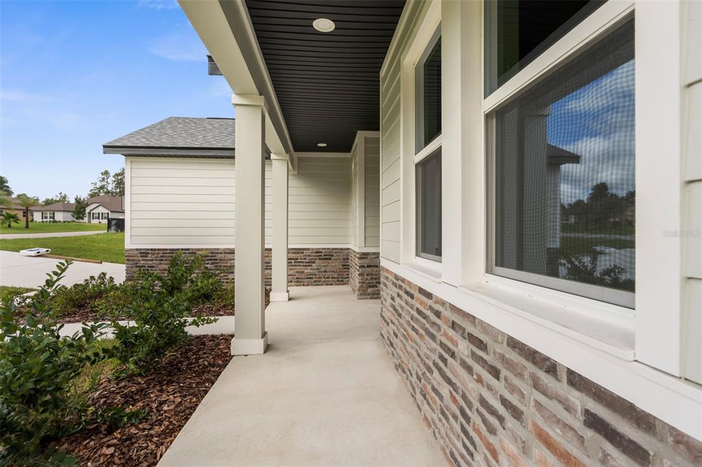 3 Lupine Street Homosassa, FL 34446 - Photo 37 of 44 a view of a house with backyard and balcony