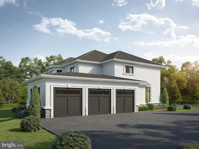 front view of a house with a garden