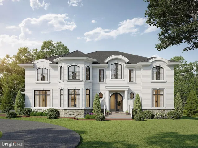 a front view of building with yard and green space