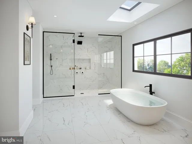 a bathroom with a bathtub and shower