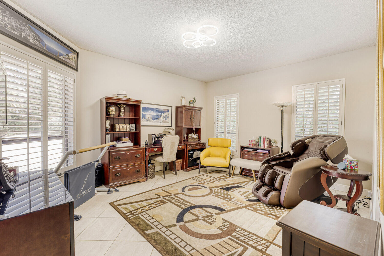 10273 St Andrews Road Boynton Beach, FL 33436 - Photo 15 of 28 a living room with furniture or couch and a window