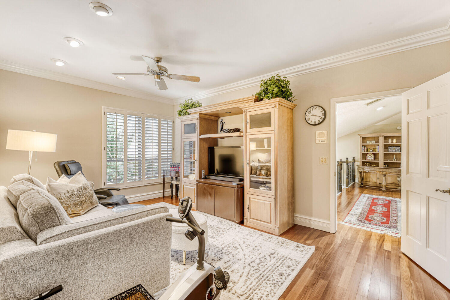 10273 St Andrews Road Boynton Beach, FL 33436 - Photo 17 of 28 a living room with furniture and a flat screen tv