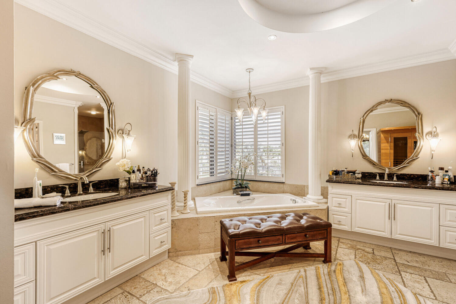 10273 St Andrews Road Boynton Beach, FL 33436 - Photo 24 of 28 a spacious bathroom with a granite countertop sink and a mirror