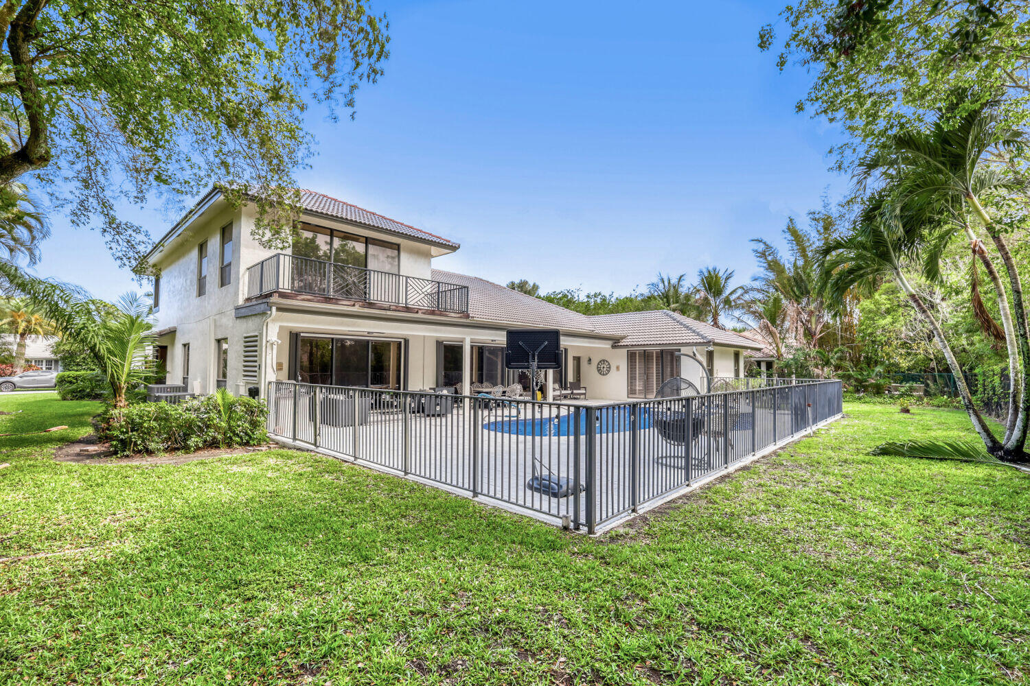 10273 St Andrews Road Boynton Beach, FL 33436 - Photo 28 of 28 a front view of a house with yard and porch