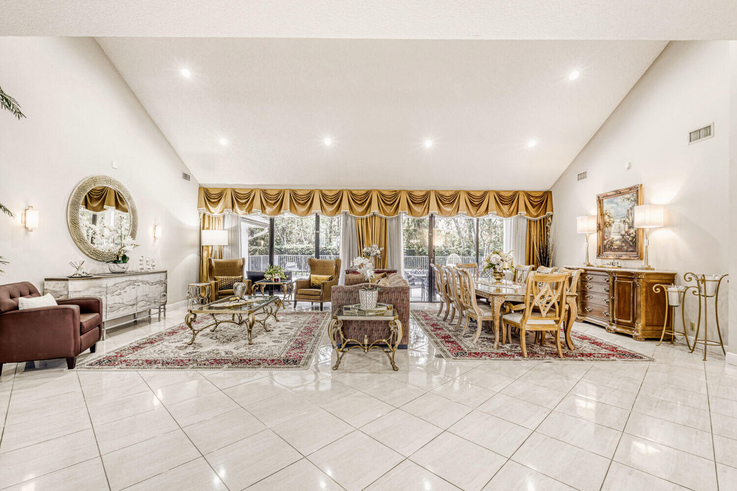 10273 St Andrews Road Boynton Beach, FL 33436 - Photo 5 of 28 a living room with lots of furniture and a large window