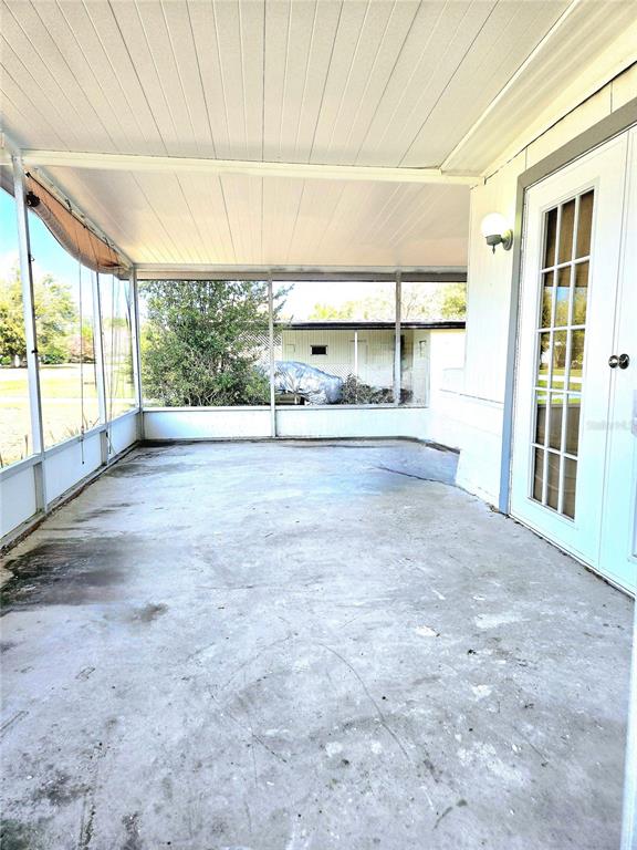 5860 Southwest 64th St Road Ocala, FL 34474 - Photo 3 of 11 a view of an empty room with a window
