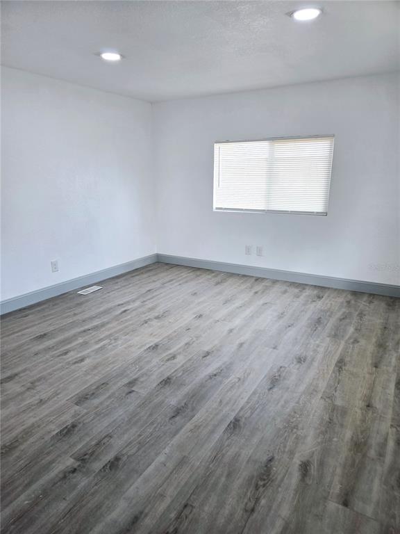 5860 Southwest 64th St Road Ocala, FL 34474 - Photo 8 of 11 wooden floor in a room