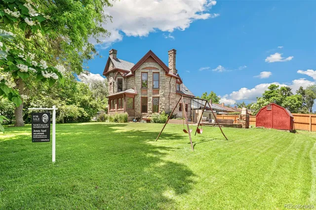 a house view with a sitting space and garden
